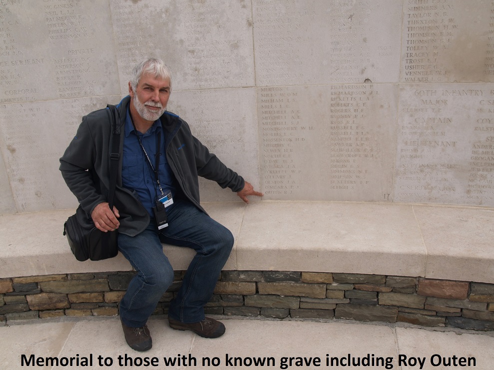 Allan points to Roy's name on the 
 VC Corner Memorial, France