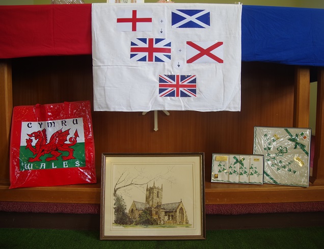 Cross of St George (England) and St Andrew (Scotland), Flag of Great Britain, Cross of St Patrick (Ireland), Union Jack flag, 
Flag of Wales, St Michaels and All Angels church, Irish embroidery