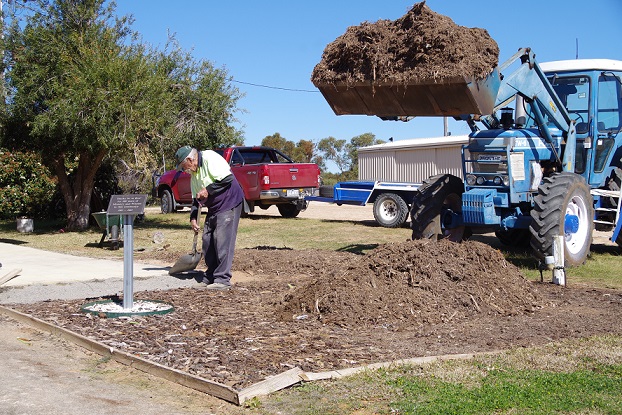 Ron (E) finishing the new access pathway at the Anglican Church